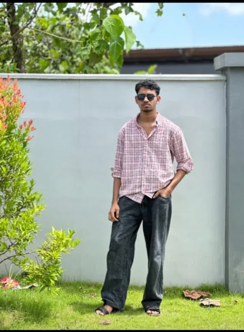 Salahudeen, Best Digital Marketing Specialist in Kannur, standing outdoors.